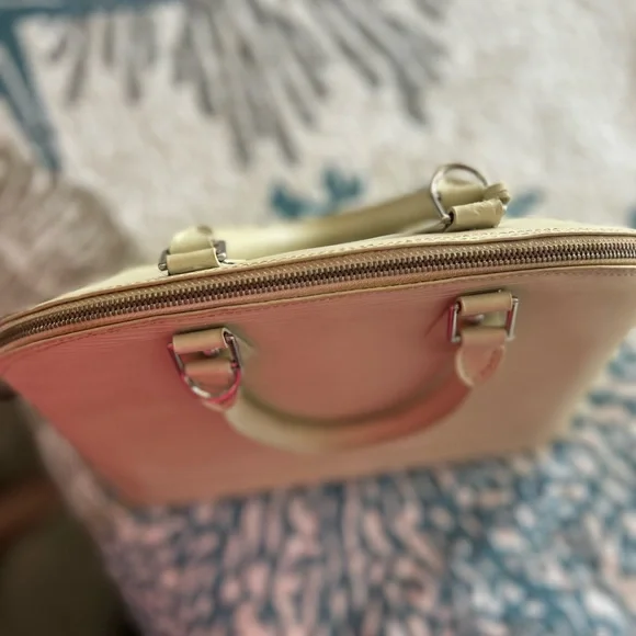 Authentic Louis Vuitton Ivory Epi Alma Textured Leather Bag - Picture 15 of 15